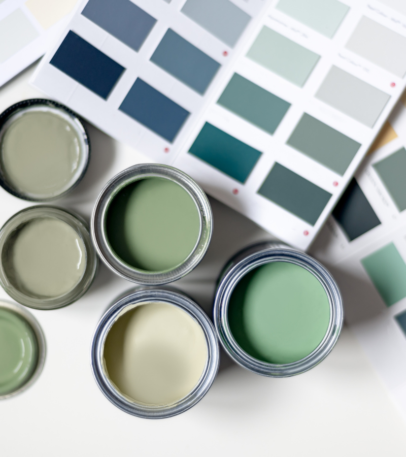 AIO Remodeling Solutions professional painting a Redmond home's exterior.
